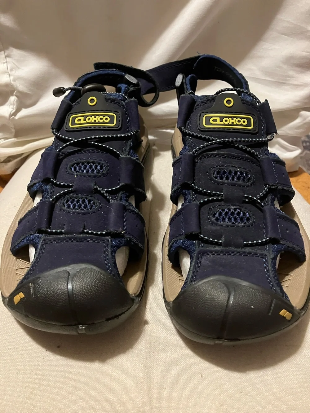 New.  Never worn CLOHCO  sz 9 men’s women’s 10 faux blue suede sandals